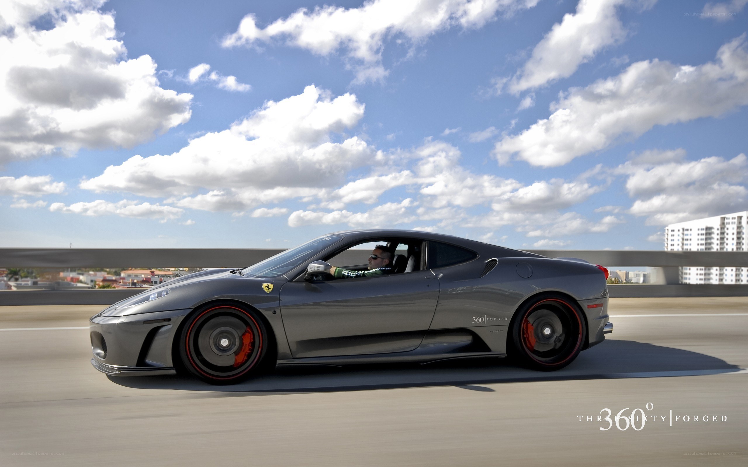 Gray Ferrari on a highway