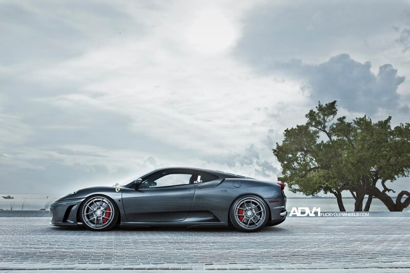 Gray Ferrari on a pier