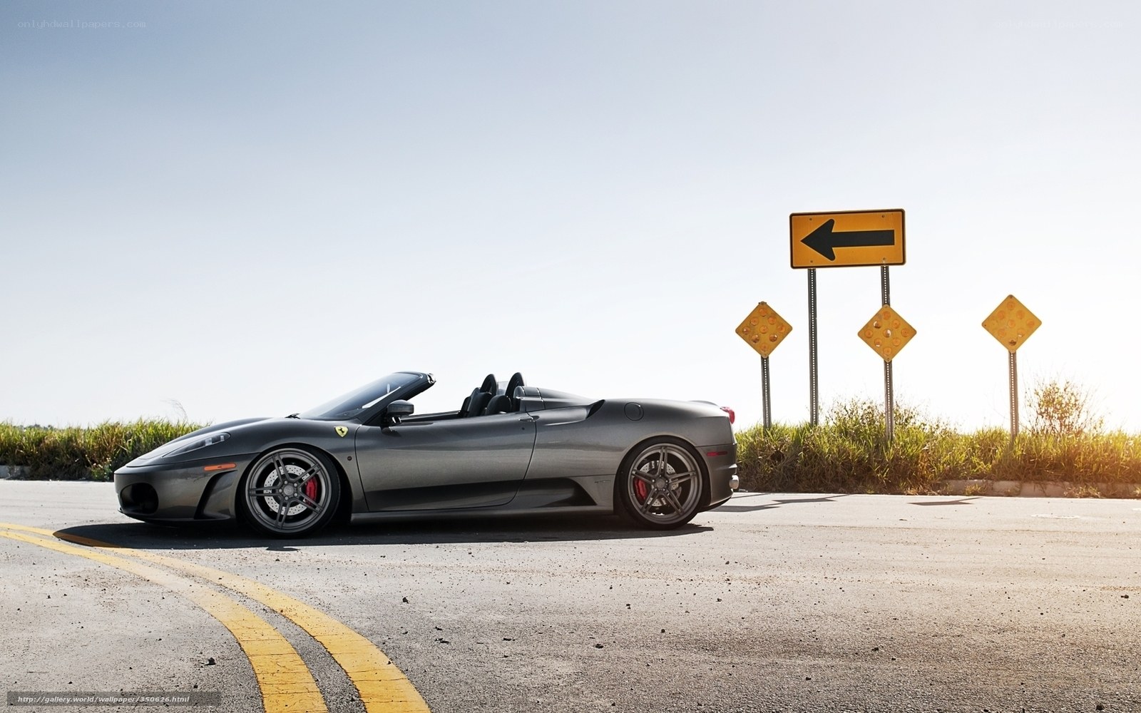 Gray Ferrari on a road