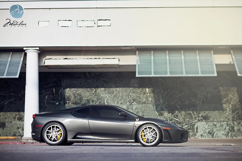 Gray Ferrari on city street
