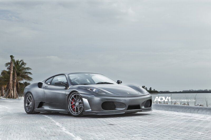 gray ferrari on cobblestone