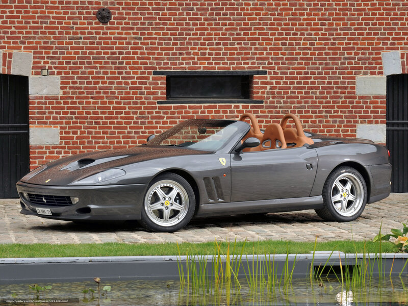 Gray Ferrari Spider parked