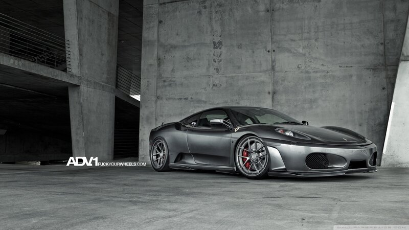 Gray Ferrari Sports Car — Dramatic, Photograph, Concrete Structure