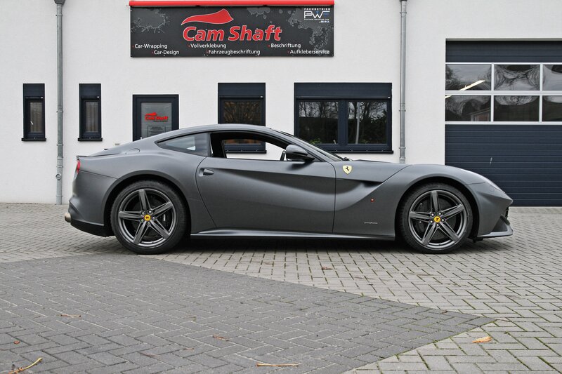 Gray Ferrari Sports Car — Neutral, Photograph, Building