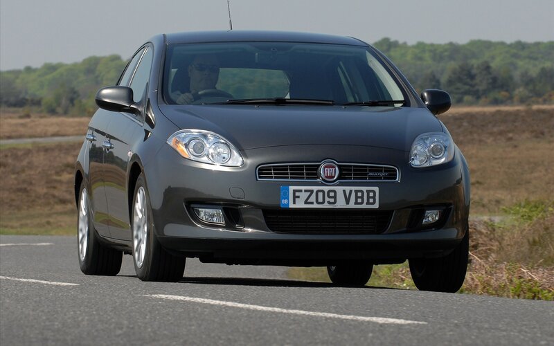 Gray Fiat Car on Road
