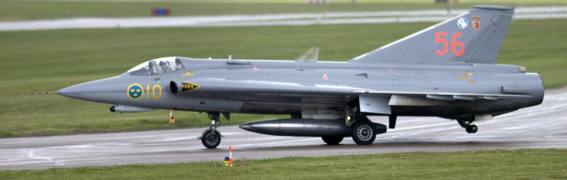 Gray Fighter Jet on Runway — Neutral, Photograph