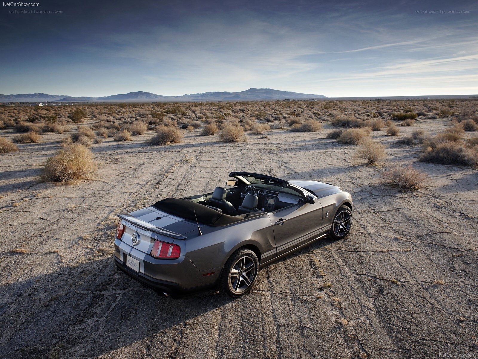 Gray Ford Mustang convertible in desert