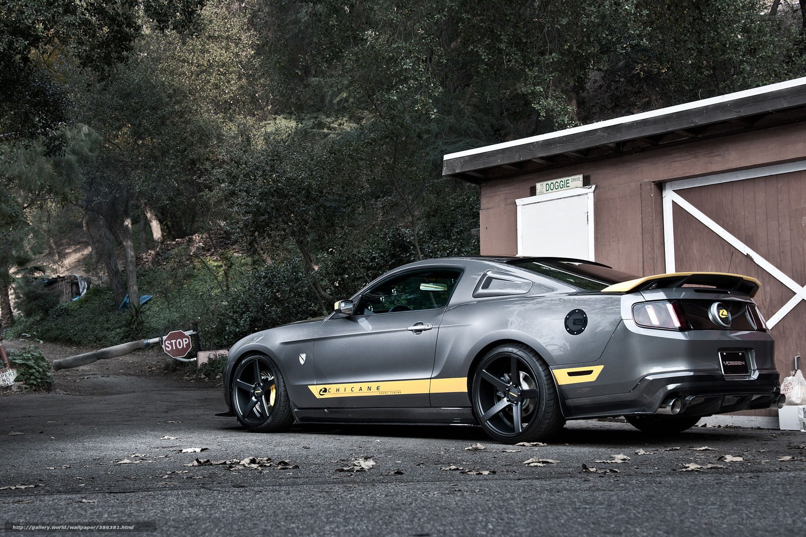 gray ford mustang with yellow accents