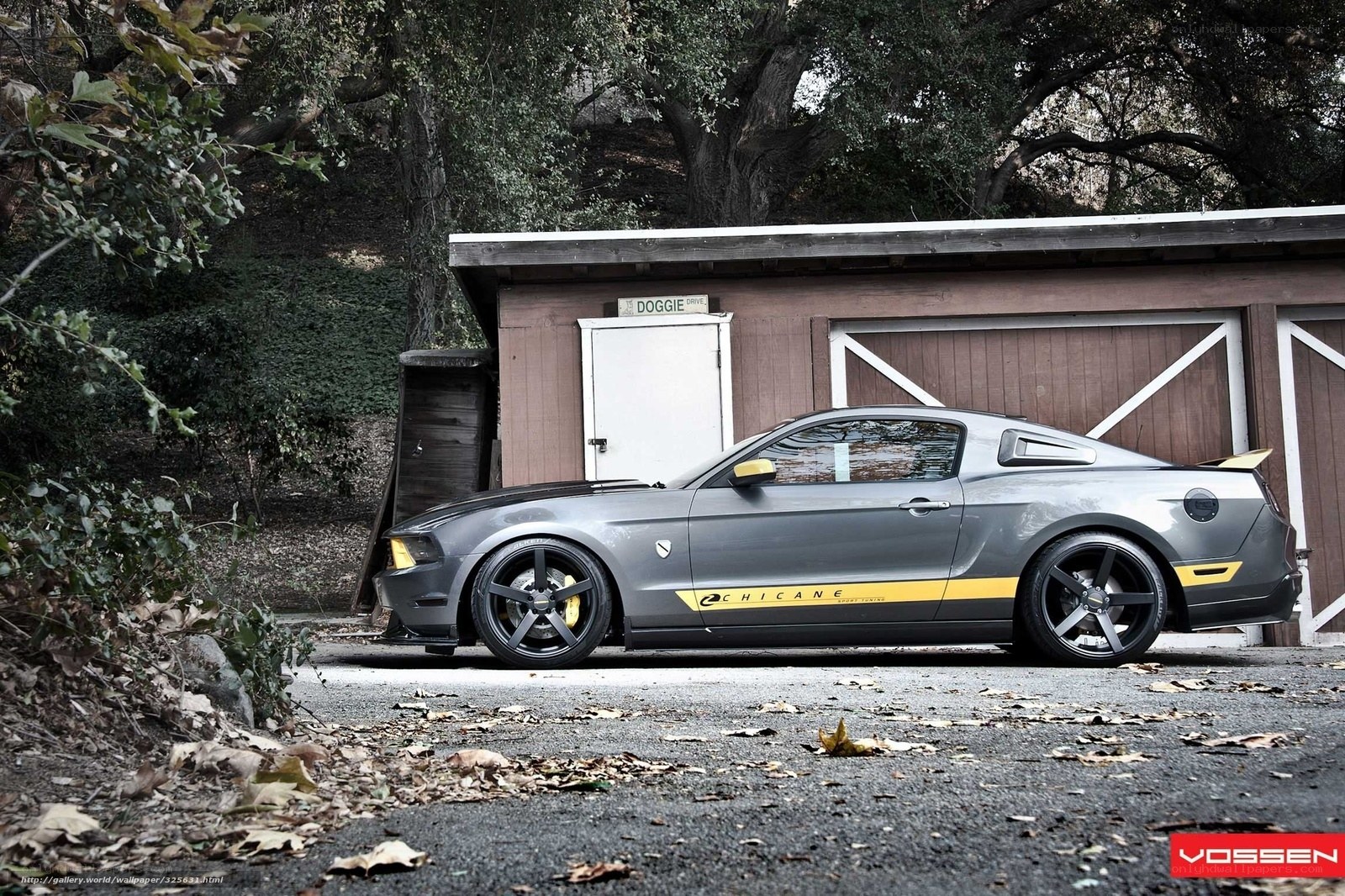 Gray Ford Mustang with yellow accents