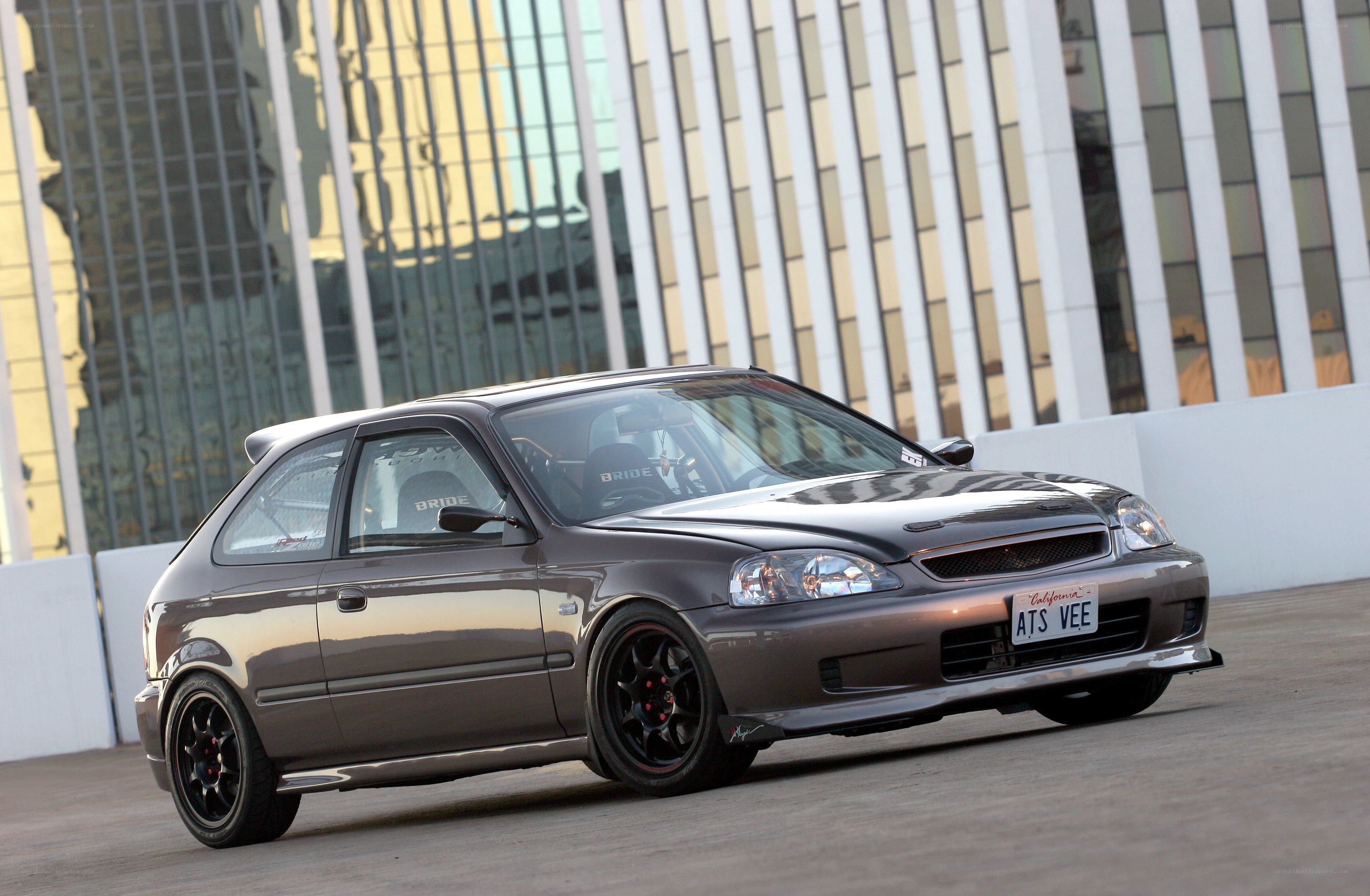 gray hatchback car in city