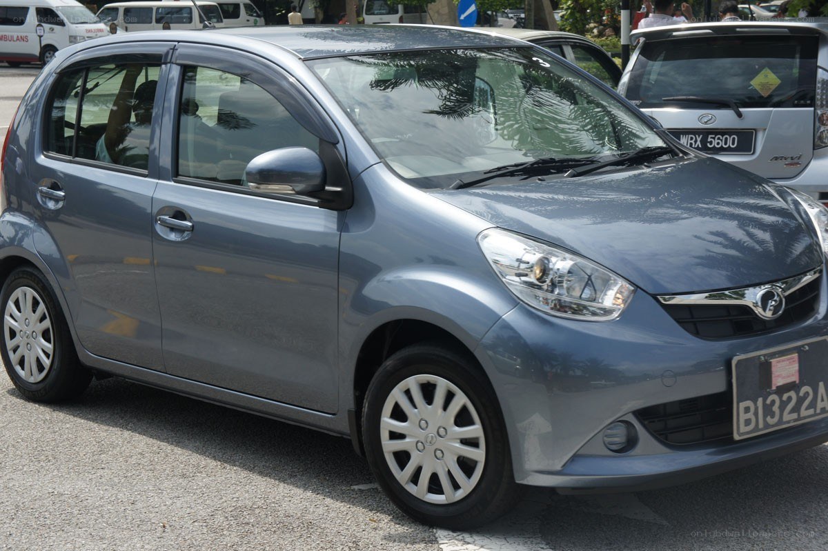 Gray hatchback car on street