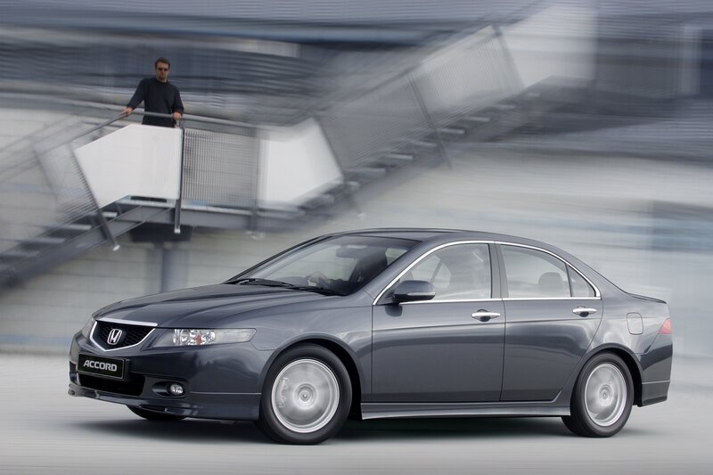 Gray Honda Accord in motion