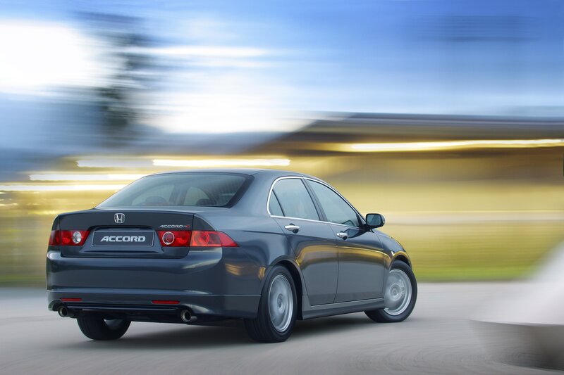 Gray Honda Accord in motion