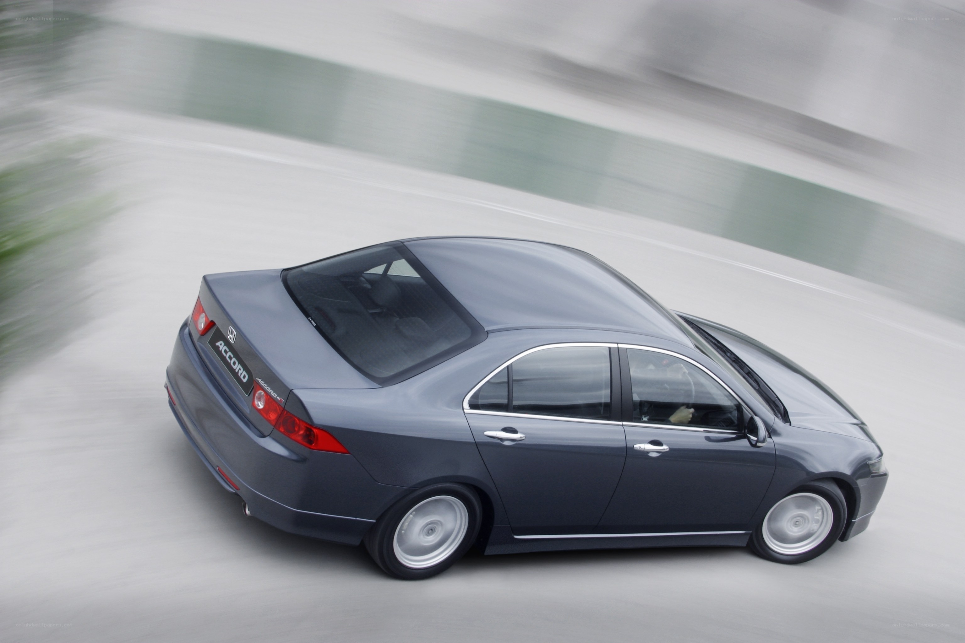 Gray Honda Accord in motion