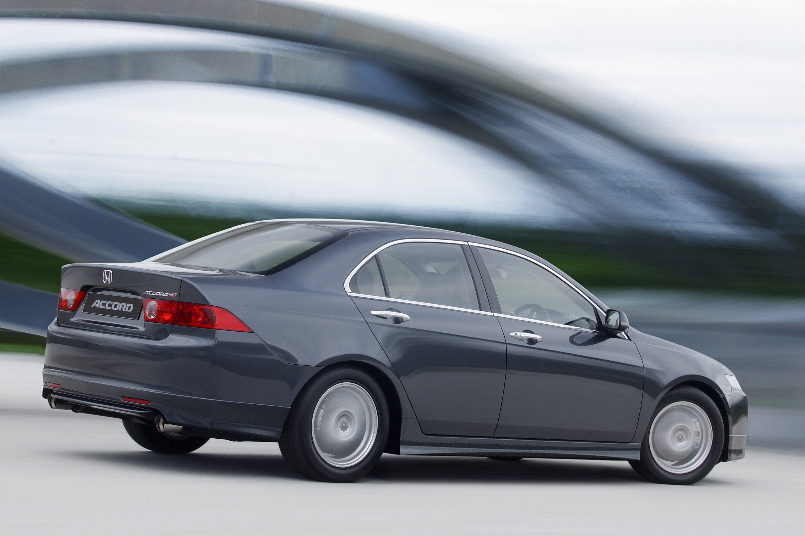 Gray Honda Accord in motion