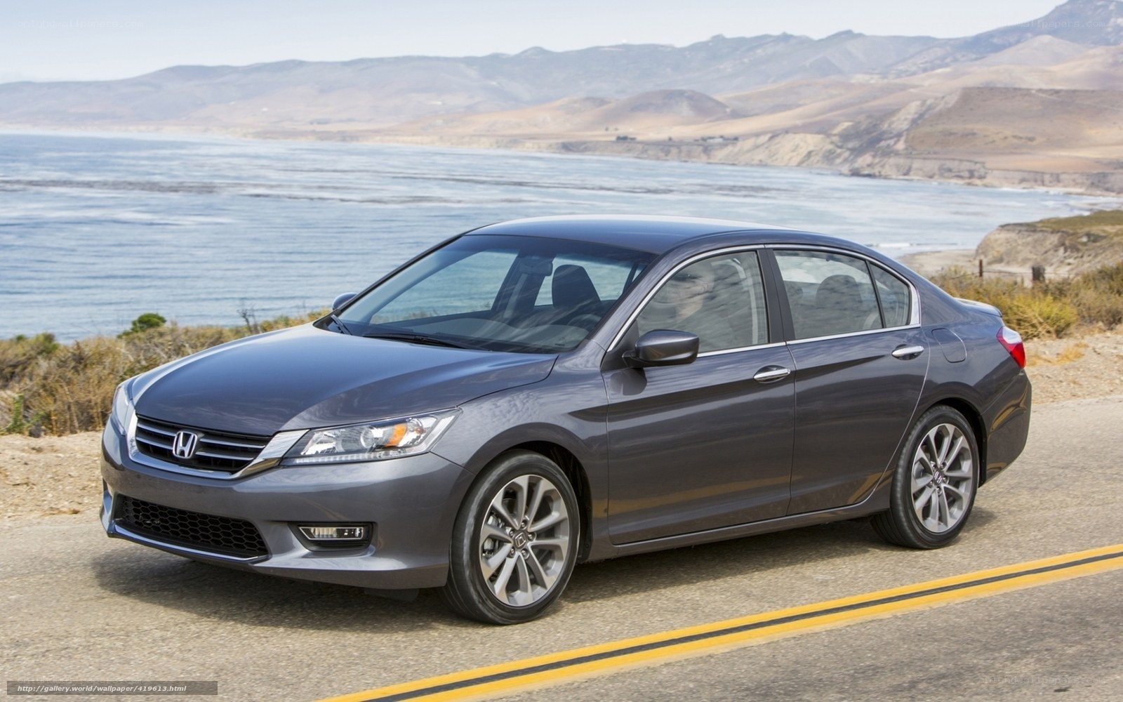 Gray Honda Accord on coastal road