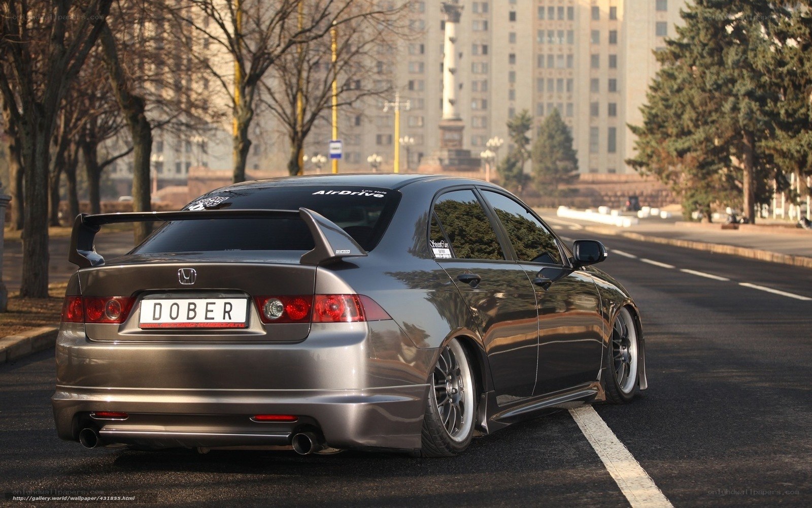gray honda civic with rear spoiler