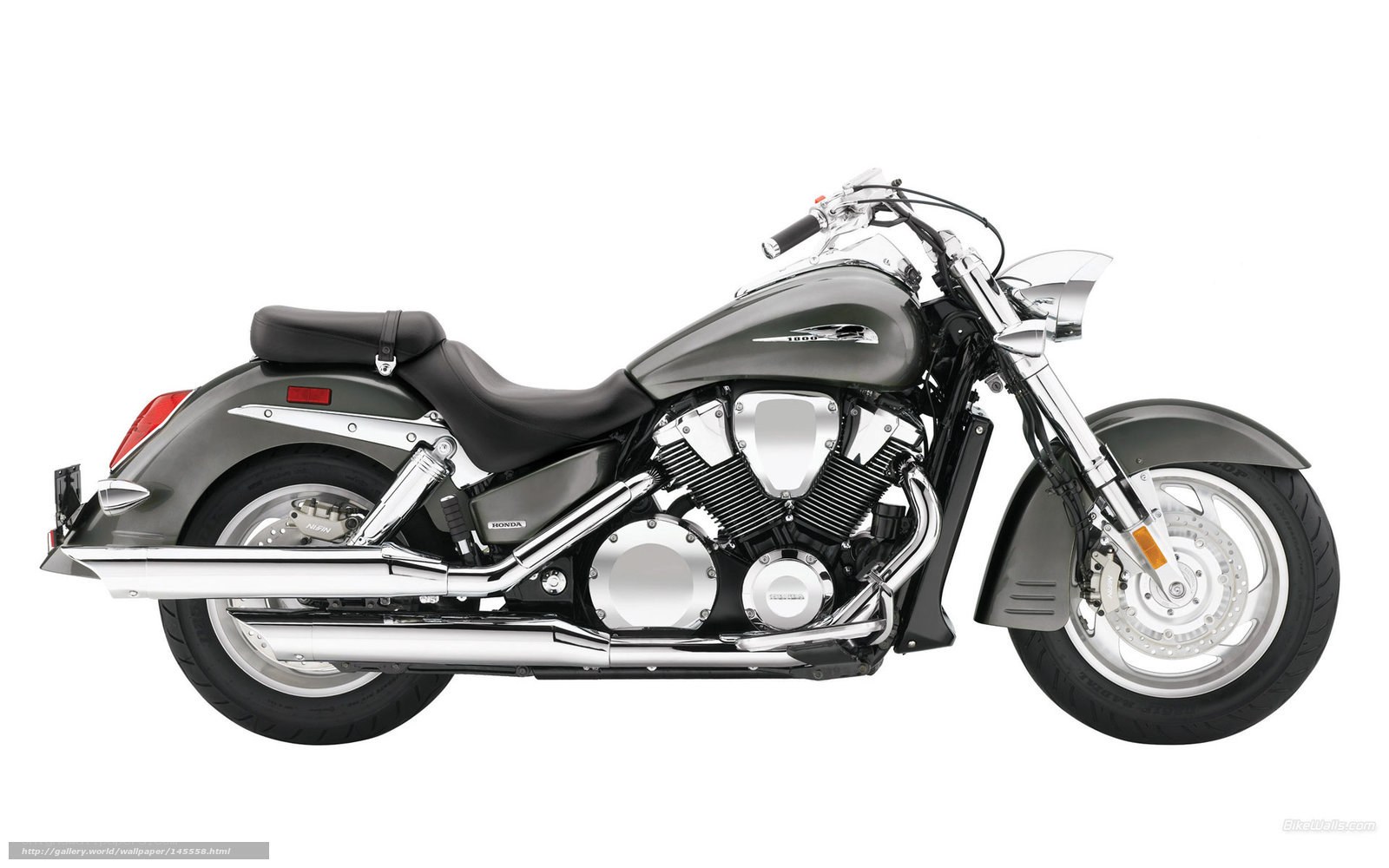 gray Honda cruiser motorcycle