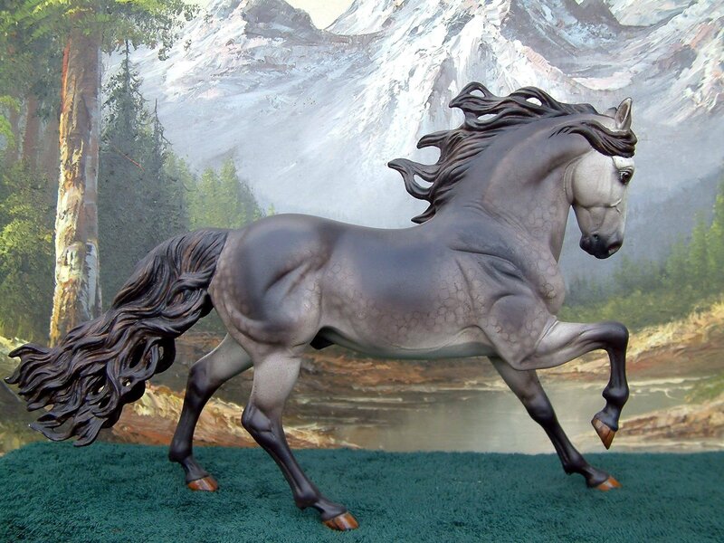 gray horse figurine in motion