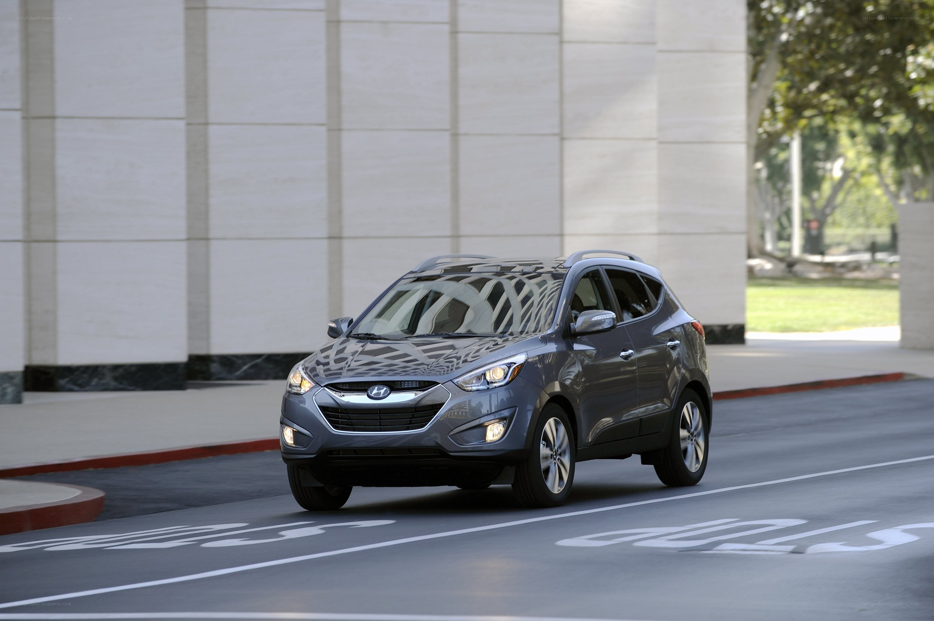 Gray Hyundai Tucson on city street