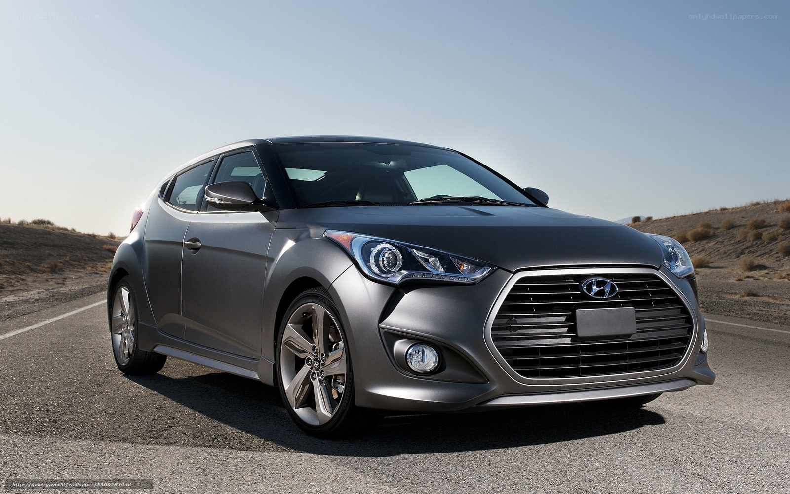gray hyundai veloster on road
