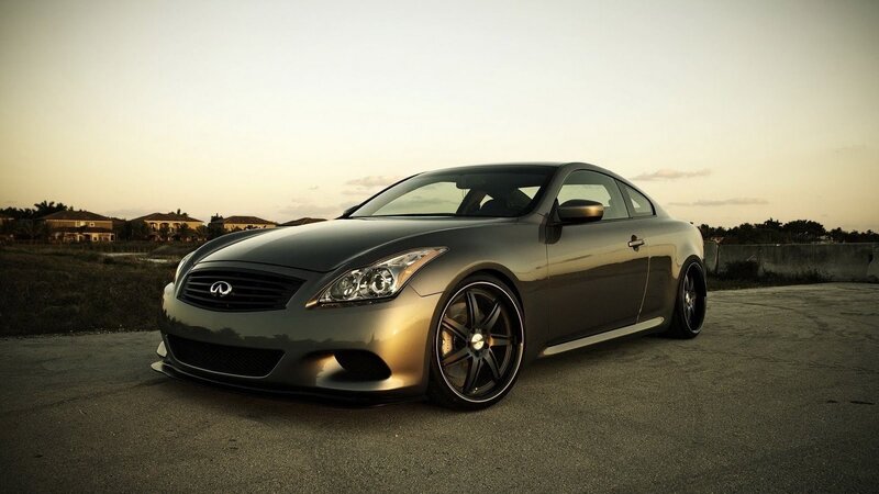 gray infiniti coupe at sunset