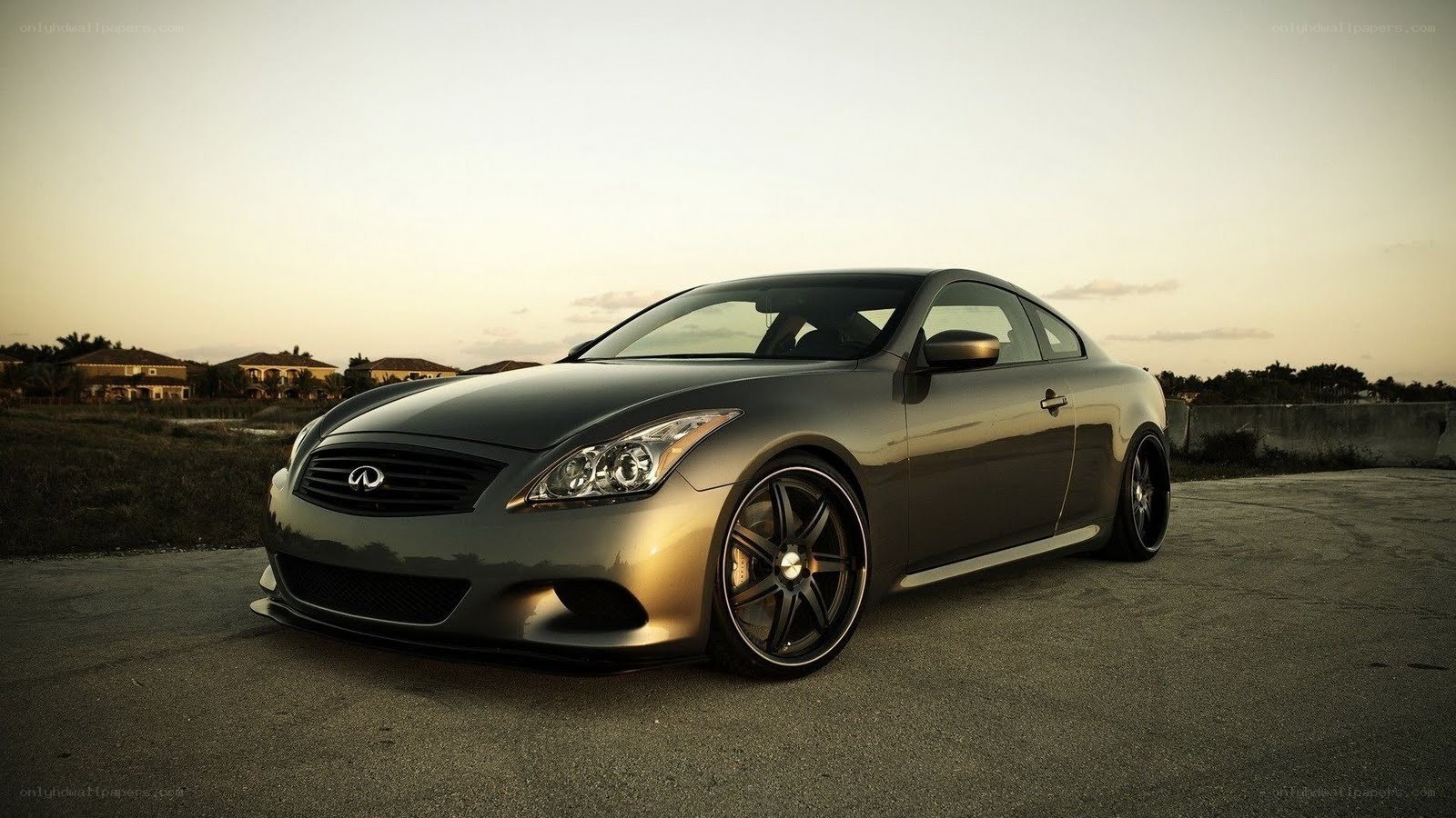 gray infiniti coupe at sunset