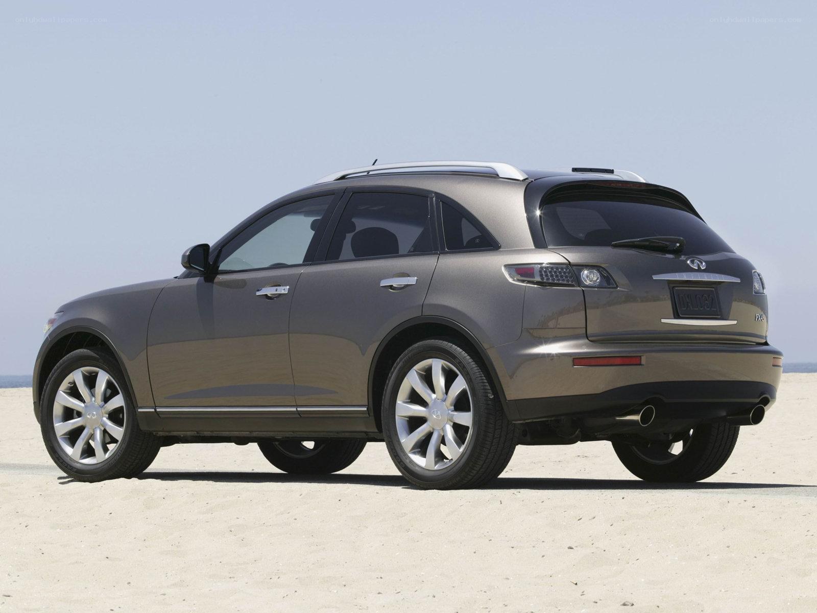 gray infiniti fx suv on beach