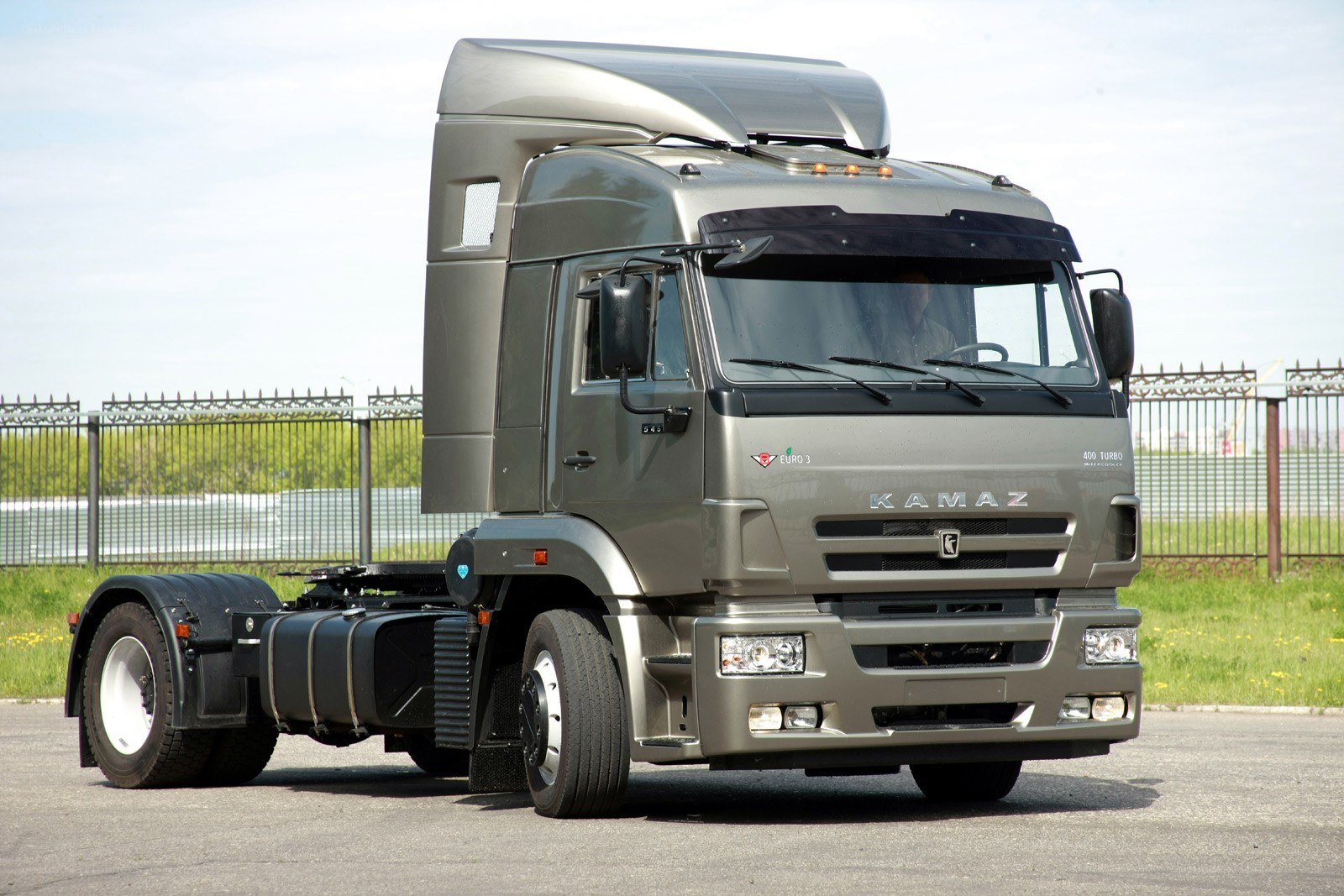 Gray KAMAZ truck on display