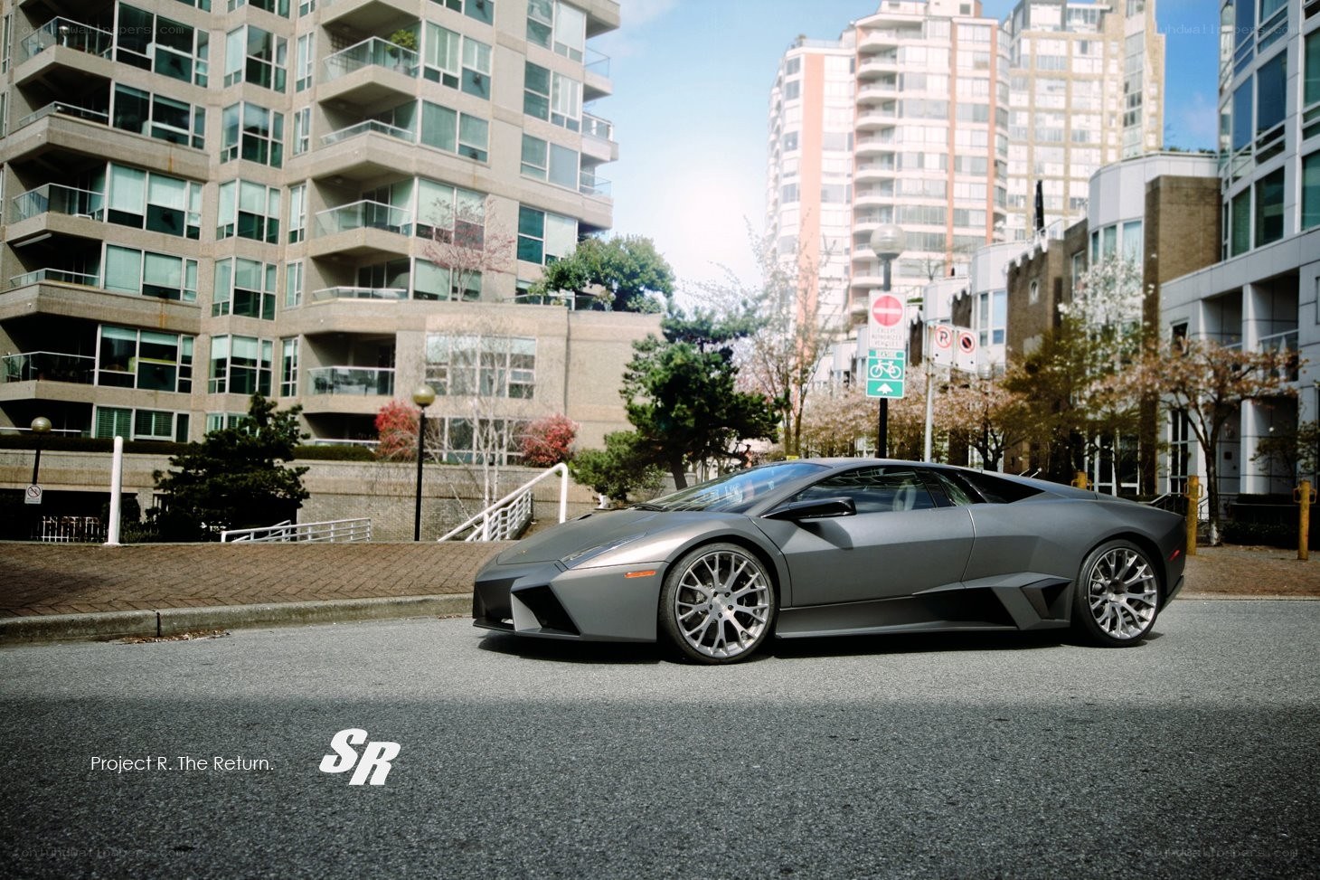 Gray Lamborghini in city