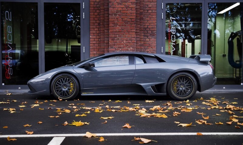 Gray Lamborghini in front of service center