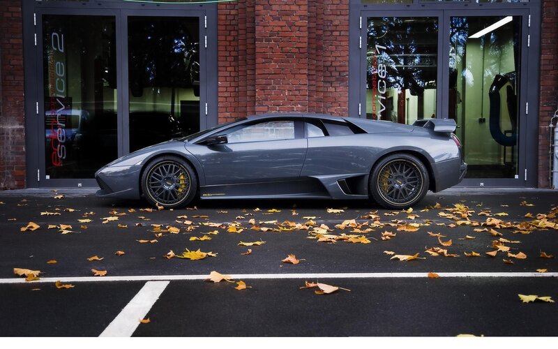 Gray Lamborghini in front of service center