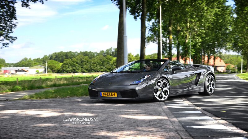 Gray Lamborghini on a country road