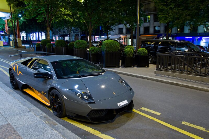 Gray Lamborghini on city street