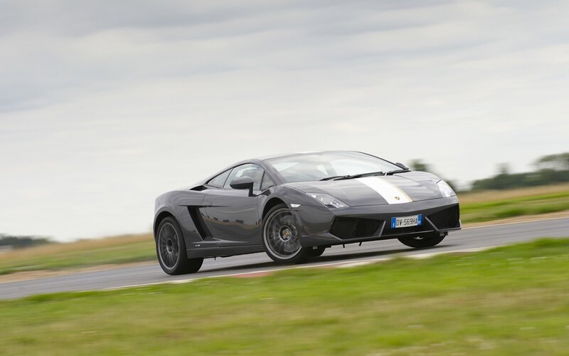 gray lamborghini on racetrack