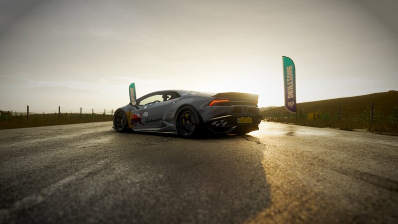 Gray Lamborghini on Road