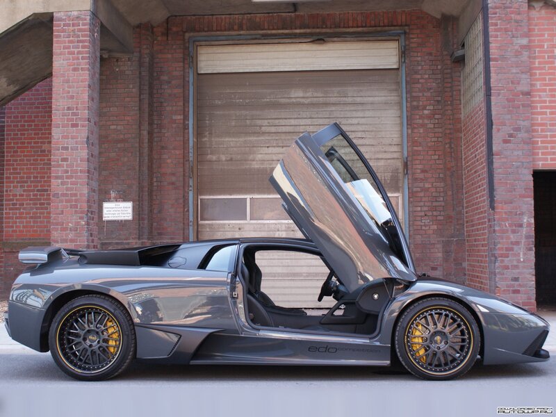 Gray Lamborghini with open doors