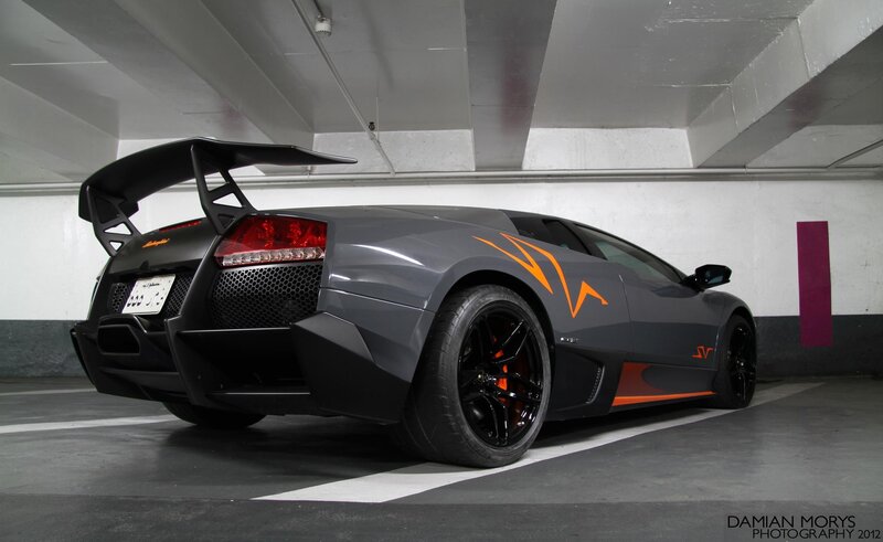 Gray Lamborghini with orange accents