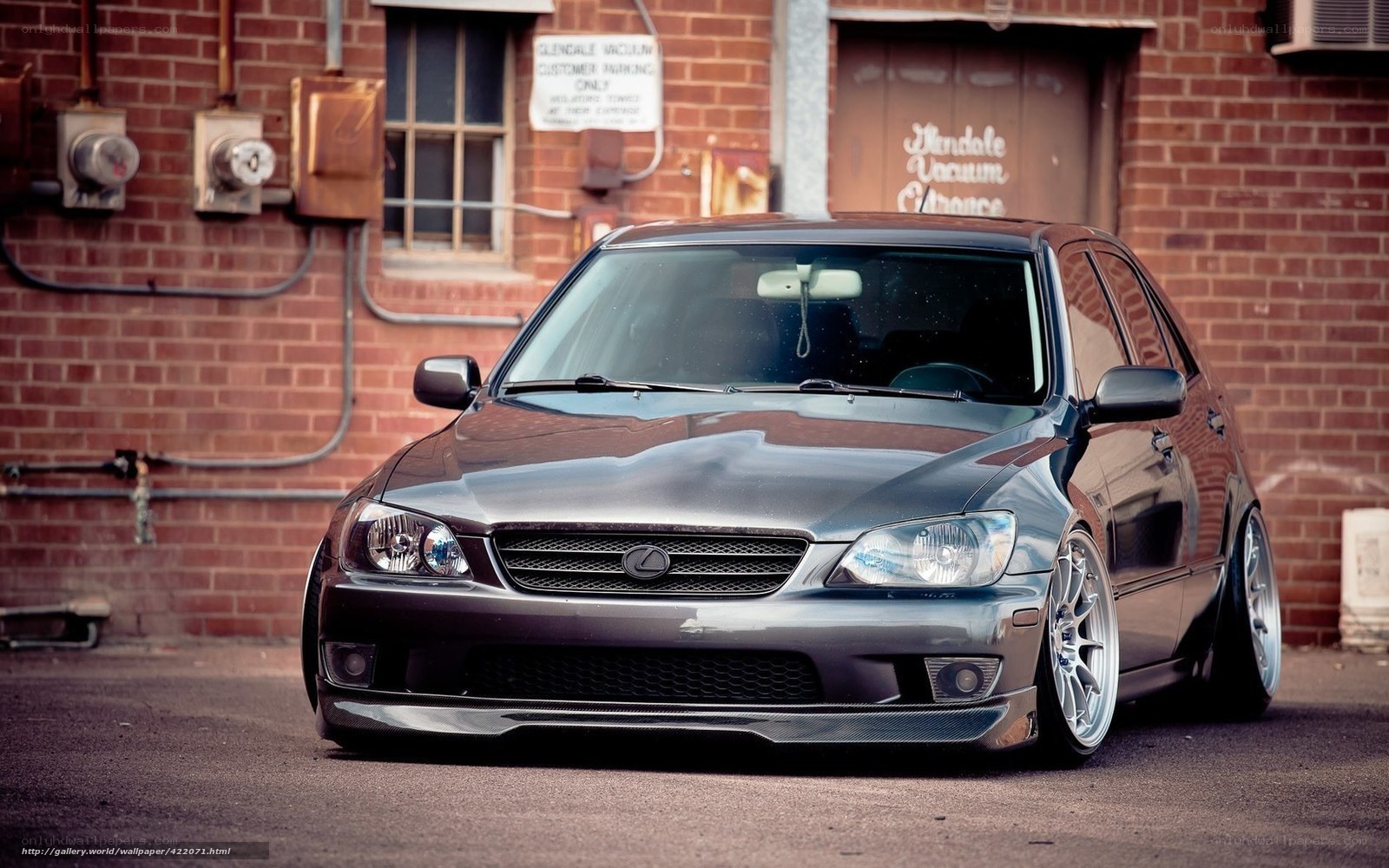 gray lexus is200t parked outside