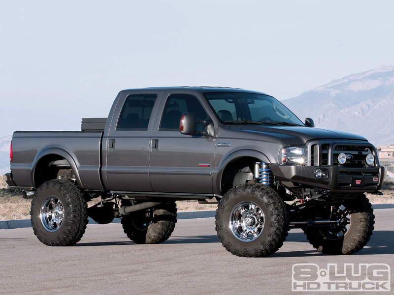 Gray Lifted Pickup Truck — Dramatic