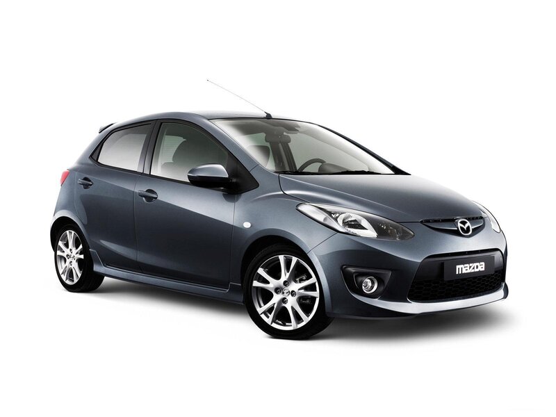 Gray Mazda hatchback car