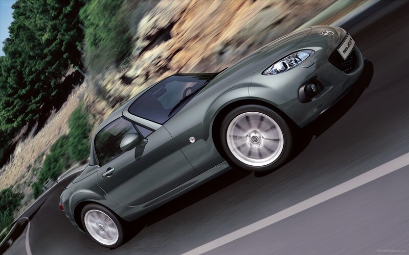 gray mazda mx-5 driving