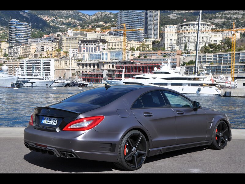 Gray Mercedes-Benz CLS parked by the harbor