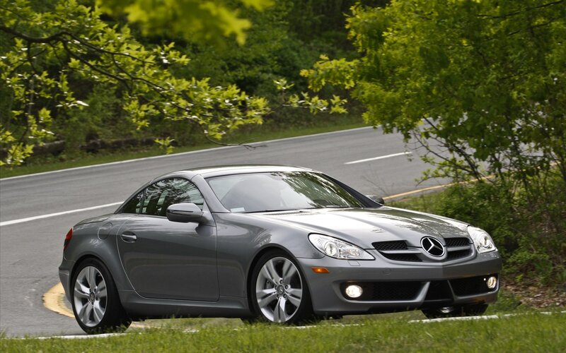 Gray Mercedes-Benz SLK on a winding road