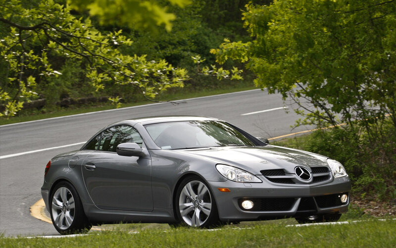 Gray Mercedes-Benz SLK on a winding road