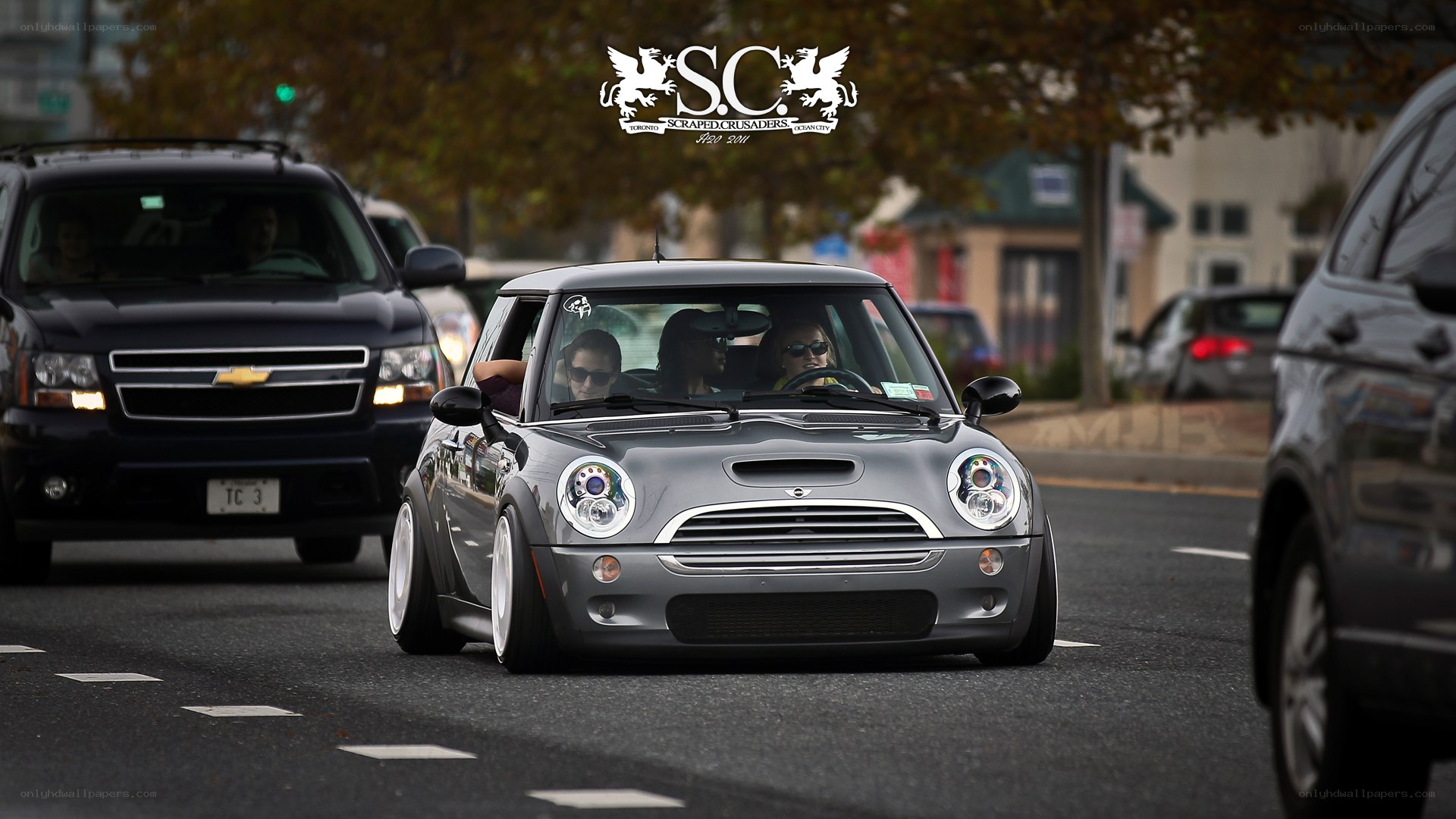 Gray Mini Cooper on city street