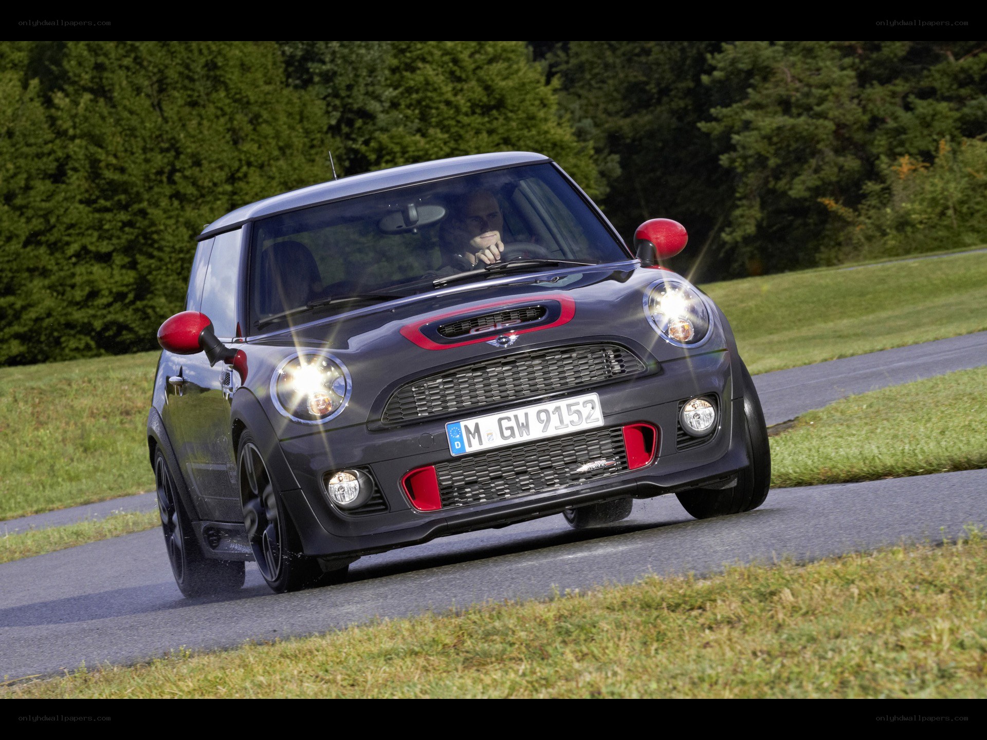 gray mini cooper on country road