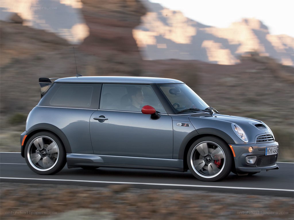 gray mini cooper on desert road