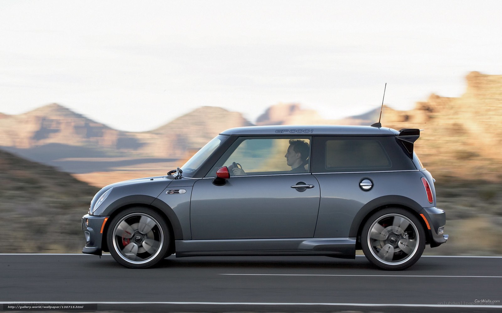 gray mini cooper on desert road