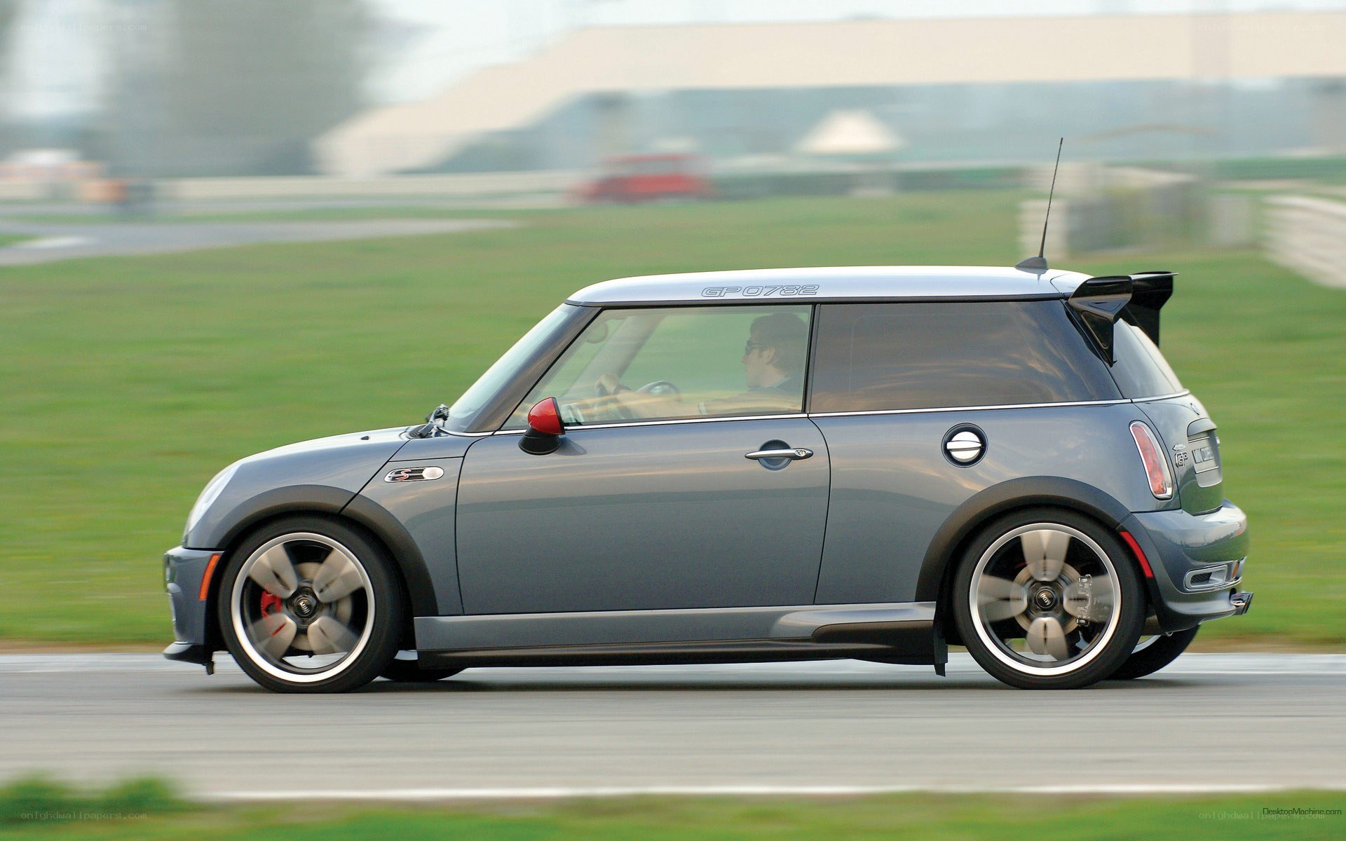 gray mini cooper on racetrack